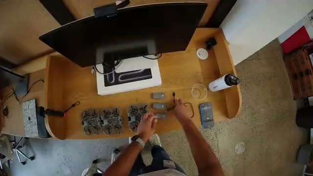 Drone batteries out and in: the head camera view
